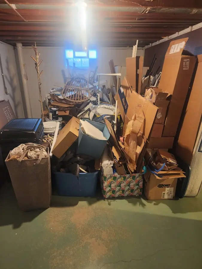 Roll-off dumpster container at job site for 20 Yard Dumpster Rental in Holden